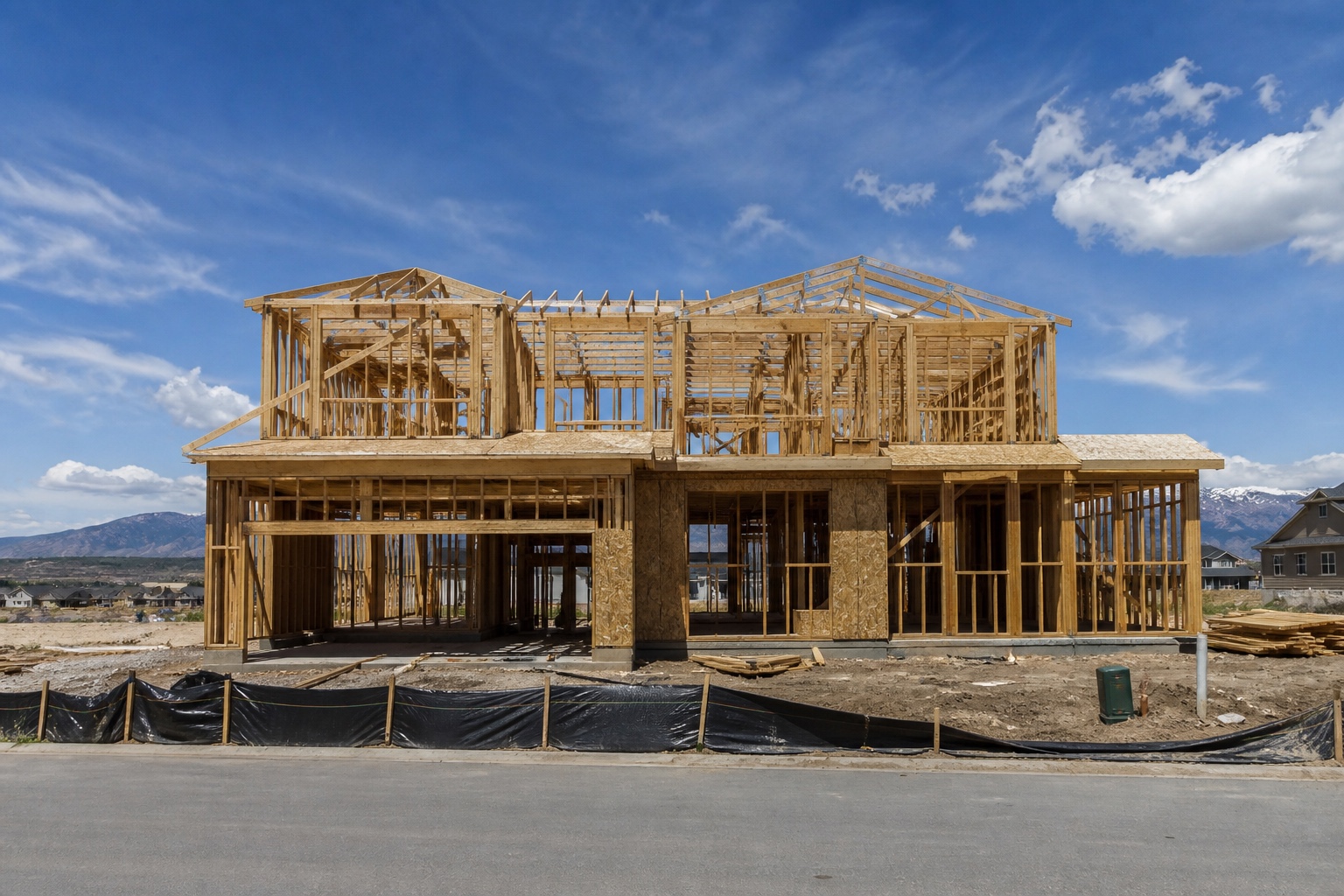 Two-story custom home wood frame on a Denver lot